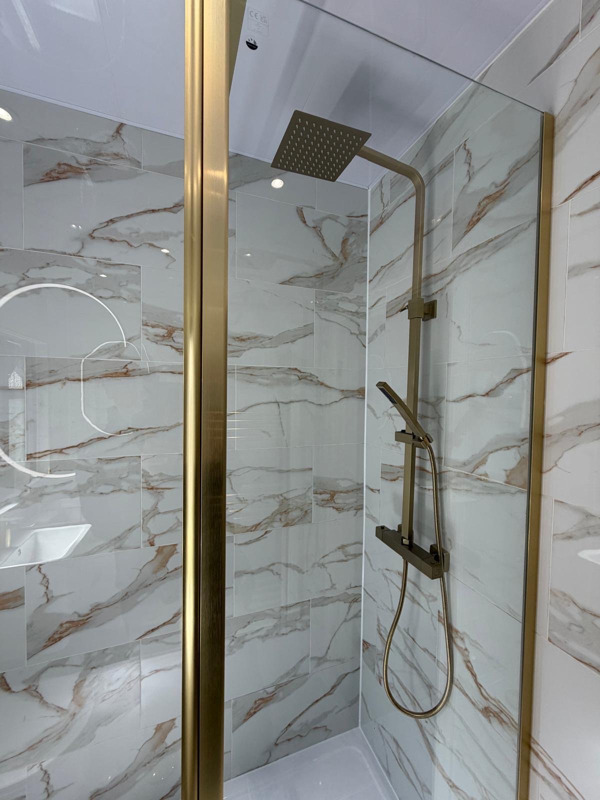 Gold Rainfall Shower with Marble Tiling